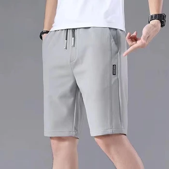 Нови летни мъжки спортни шорти плътен цвят прав модел хлабав тип ластик шнур случайни шорти джогинг панталони